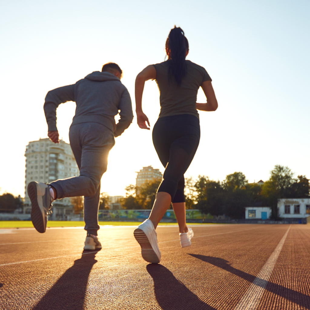 A pair of joggers - running together